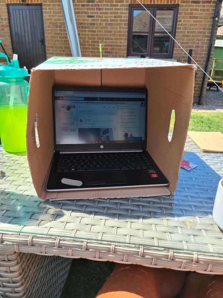 LinkedIn user Tom Wood shared how he places his laptop in a box outside to avoid sun glare