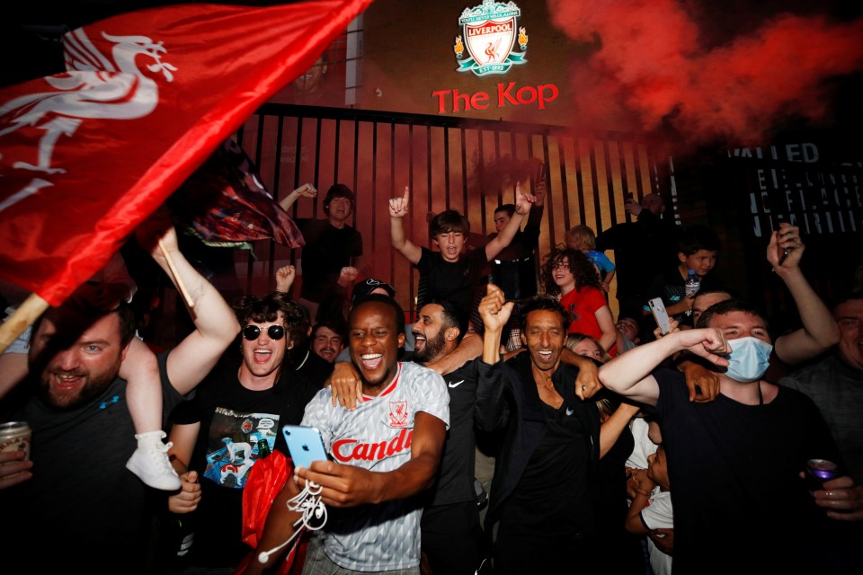 Liverpool fans celebrate winning the Premier League