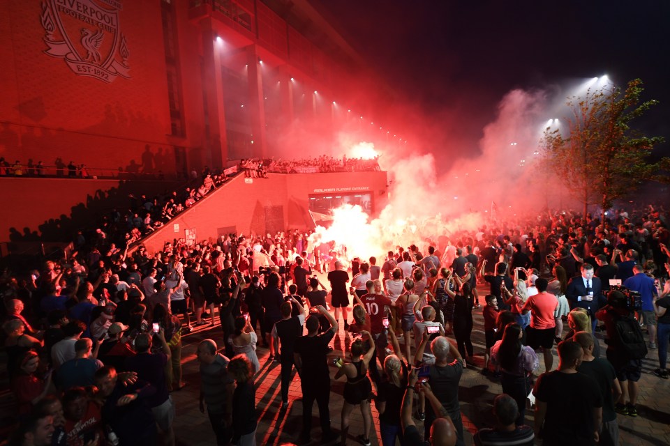 There was a party atmosphere outside Anfield tonight after Liverpool won the league title 