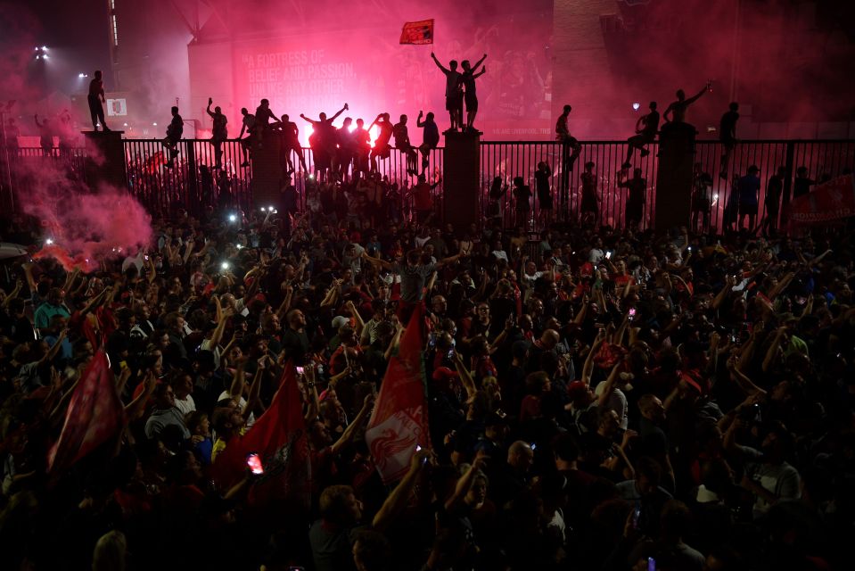 There were raucous celebrations outside Anfield tonight