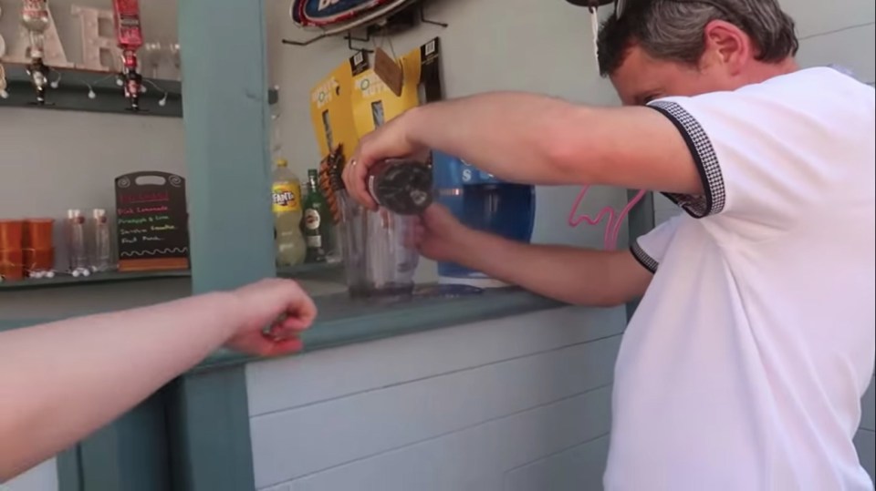 Dad Noah operates the Slush Puppy machine