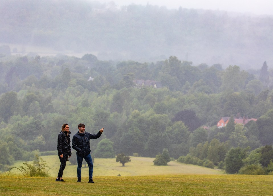 Walkers brave the midsummer rain on Box Hill in the Surrey Hills