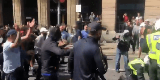 One officer was kicked in the back by violent pro-statue thugs