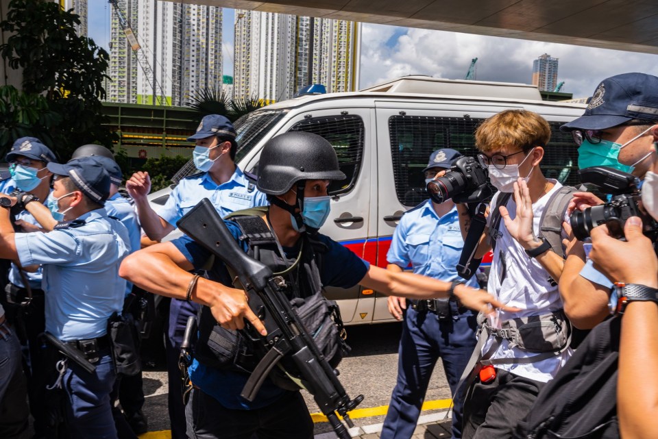 Tong Ying-kit arrives at court after he was the first person charged for incitement to secession and terrorist activities under the security law