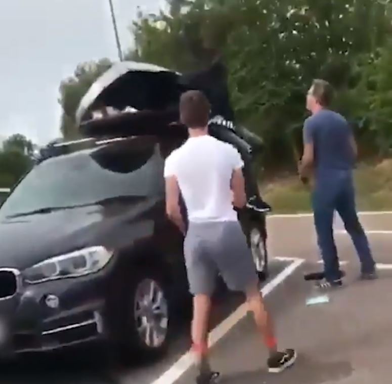 "What the f*** are you doing, you c***," the man named 'Colin' (blue shirt)c says before telling one to "get out of my sight"