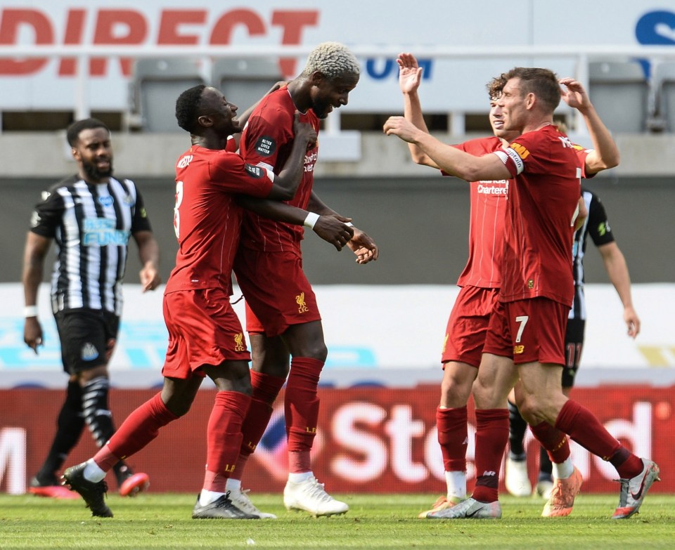 Divock Origi celebrates scoring Liverpool's second goal