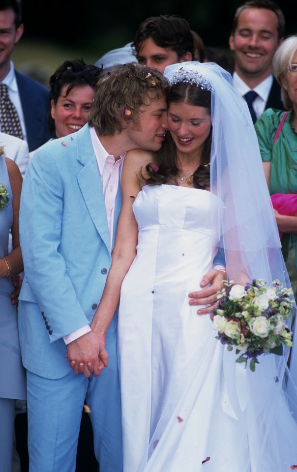 Jamie and Jools hand in hand on their wedding day 20 years ago