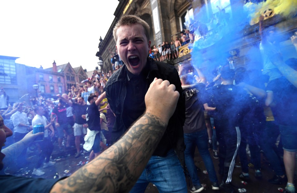 Leeds fans partied in the streets after they sealed their return to the Premier League