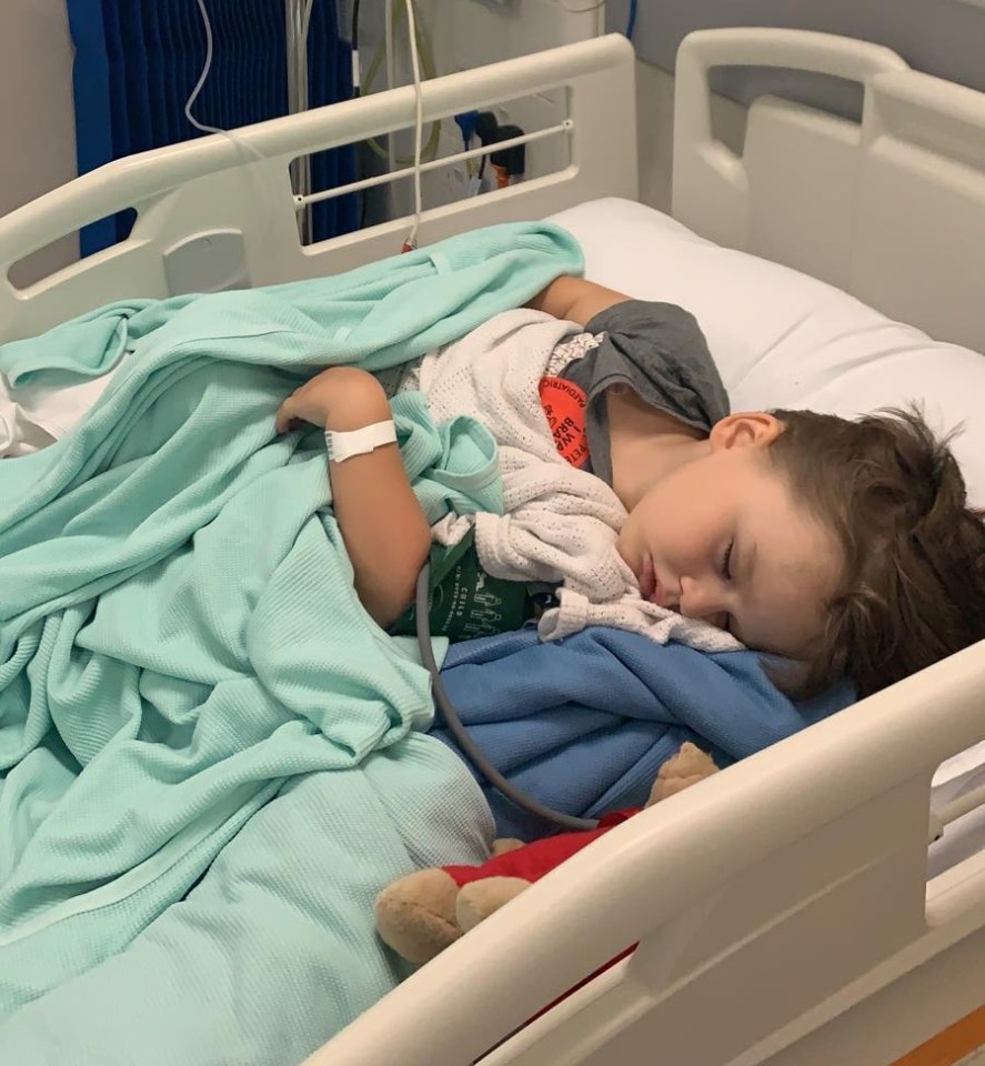 Lewis Wise, 3, in his hospital bed after he was attacked by an adder snake