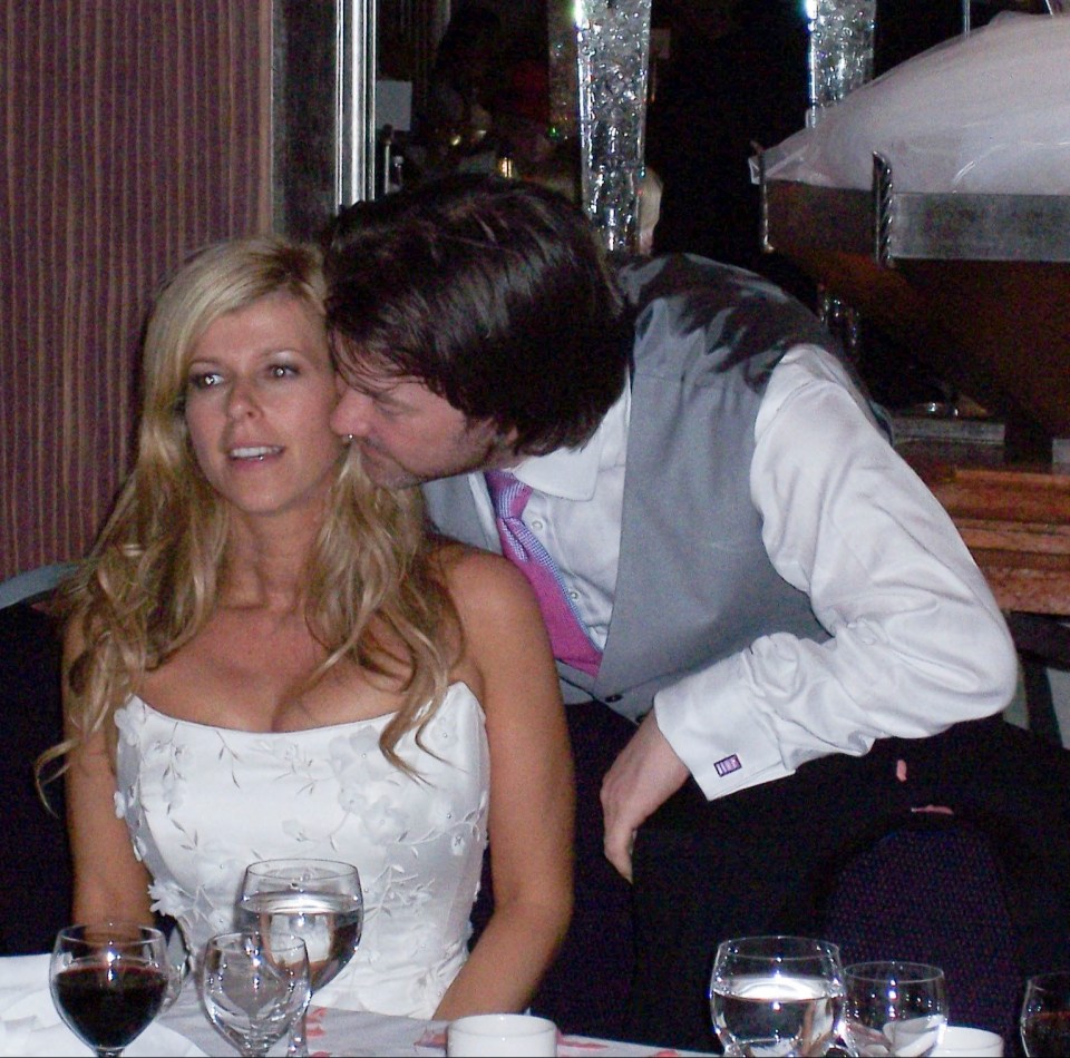 The couple sharing a quiet moment at their wedding in north London in 2005