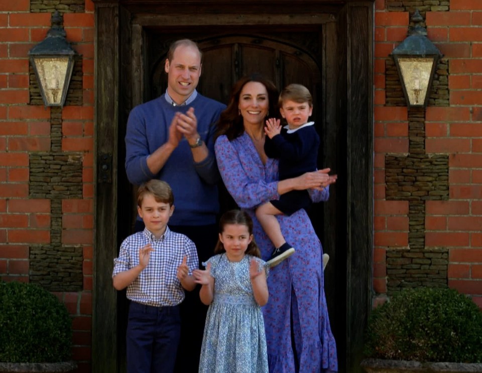 The family released this shot from Anmer Hall doing the Clap for Carers