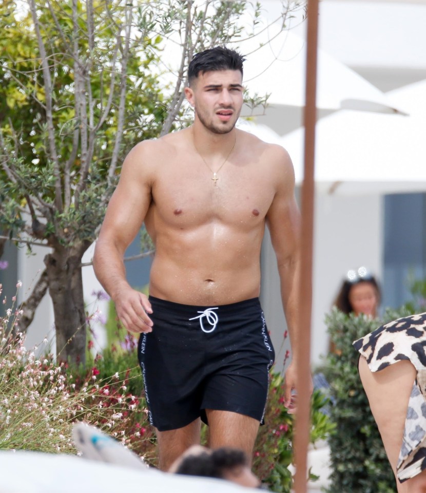 Tommy showcased his gym-honed physique in a pair of black shorts