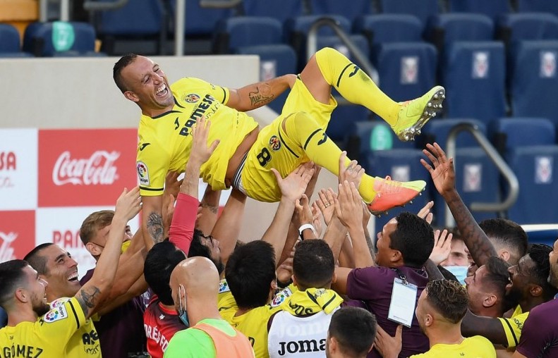 Villarreal players lifted Santi Cazorla aloft