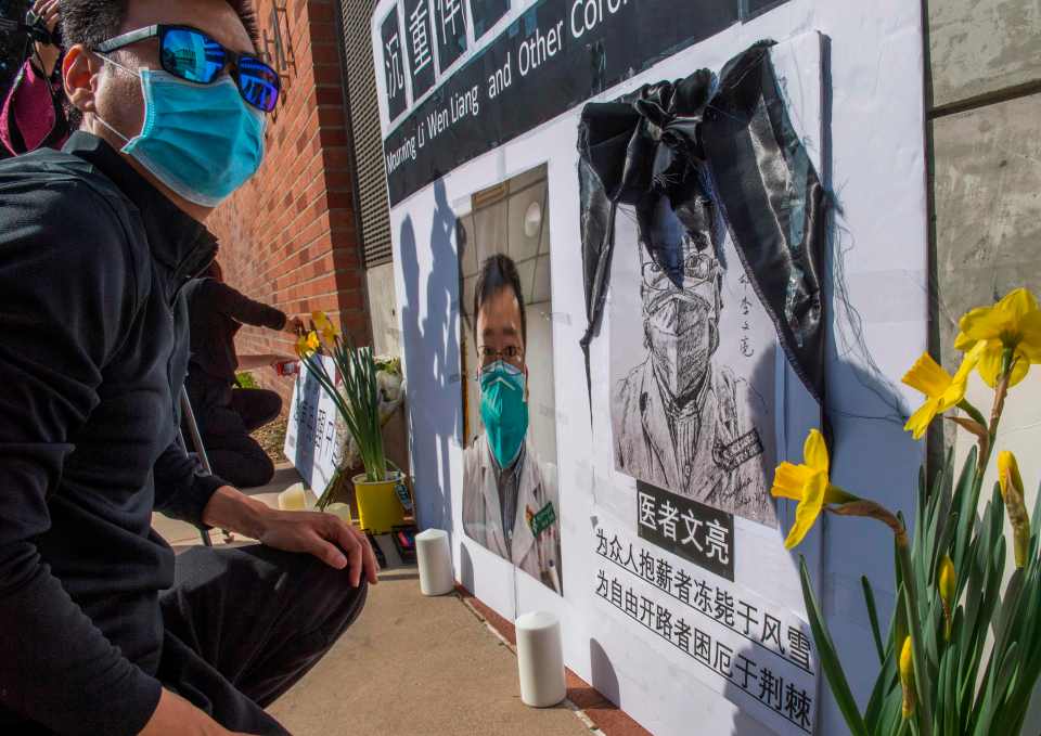 Chinese students and their supporters hold a memorial for Dr Li Wenliang