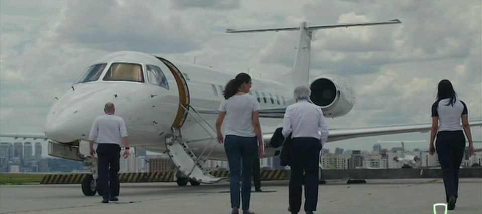 The private Dassault Falcon 7X jet carts Bernie around