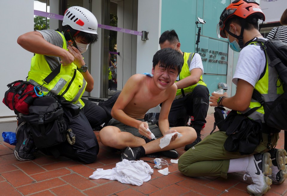 A journalist is treated after being pepper-sprayed