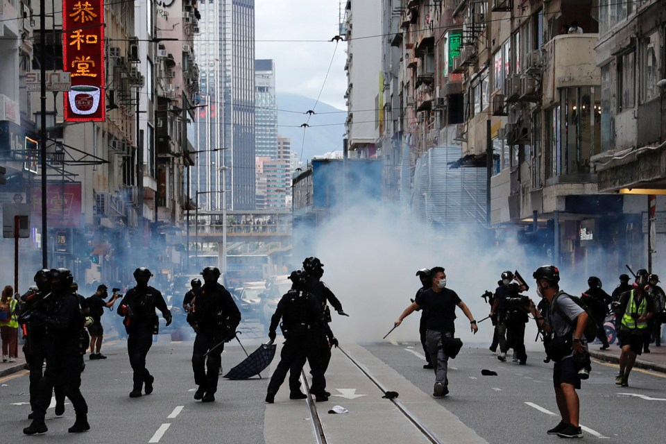 Riot police also fired tear gas to disperse the demonstrators