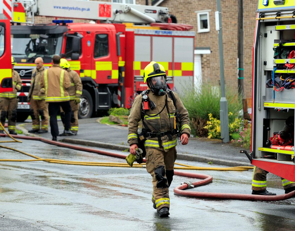 Firefighters at the scene of the explosion 