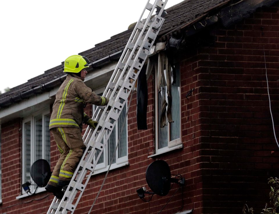 The house next to the van was also damaged