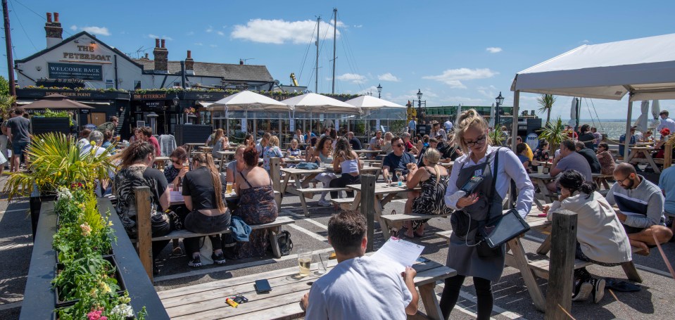 The crowds came out today to enjoy the sunshine at  the Peterboat pub at Leigh-on-Sea in Essex