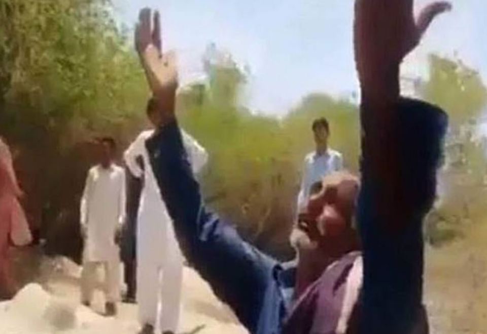 In a video posted to Twitter, her father can be seen crying over her grave