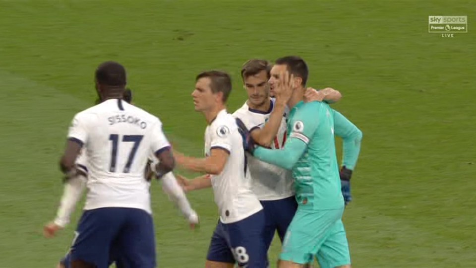  Sissoko and Lo Celso try to move Son away as Winks tries to calm Lloris down