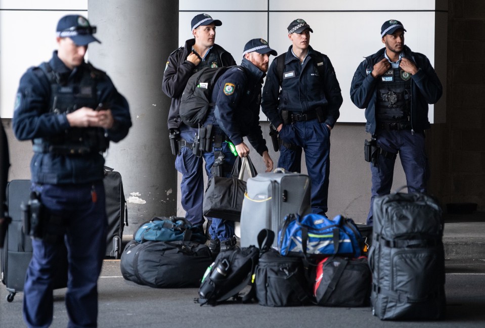 Cops at Sydney Airport before heading to protect the NSW border