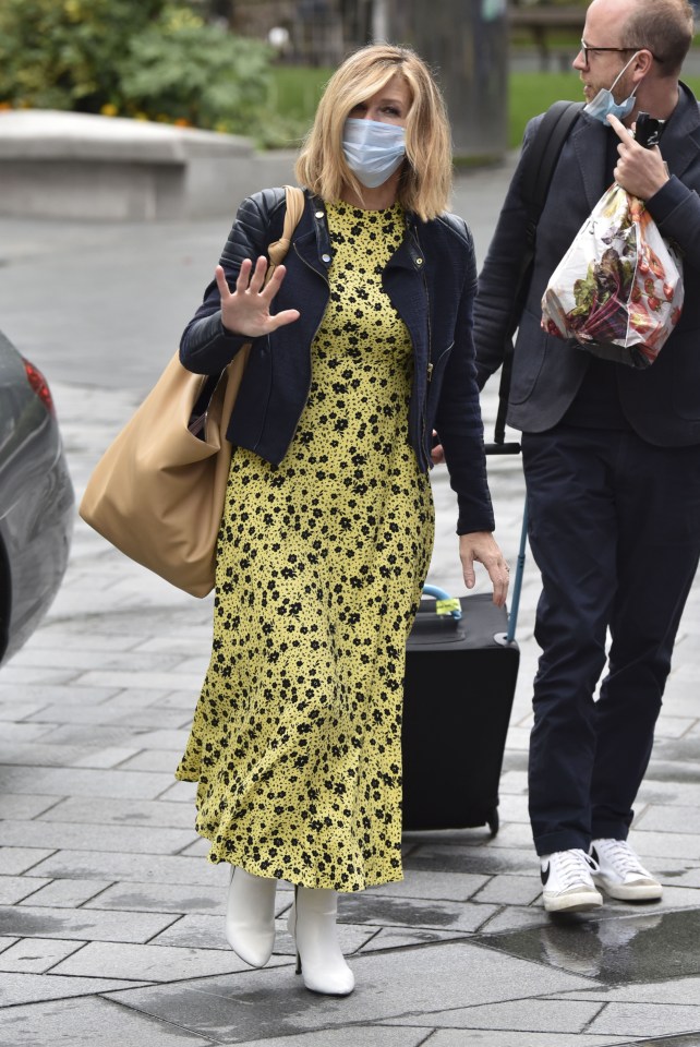 Brave Kate put on a defiant display in a yellow maxi dress and black leather jacket