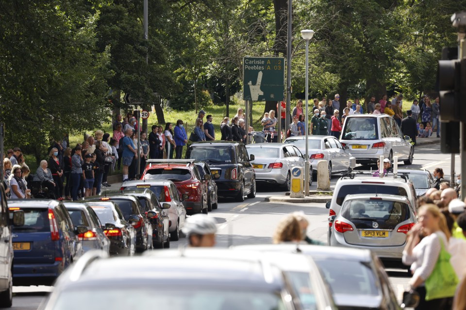 Hundreds lined the street where three-year-old Xander Irvine was killed