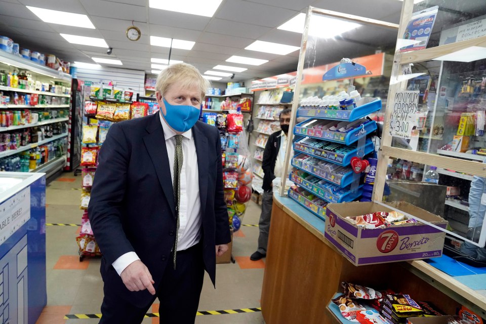 The PM was sporting a blue mask in a shop last week