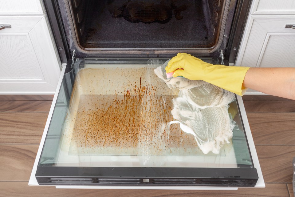 Mix together dish soap, baking soda and vinegar to make a paste that will remove oven grime