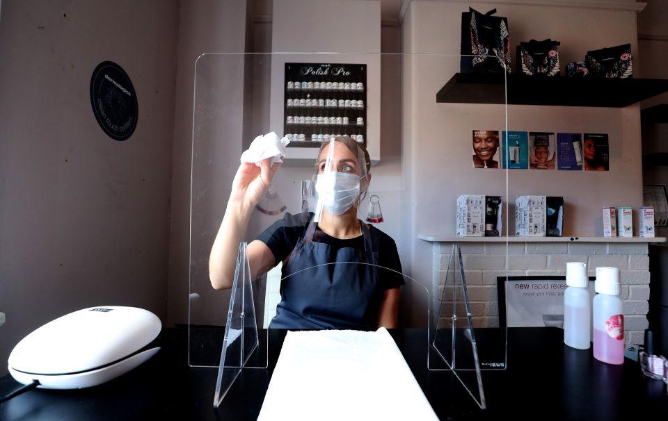 Roberta's beauty salon, like others, are required to have perspex screens and wear visors