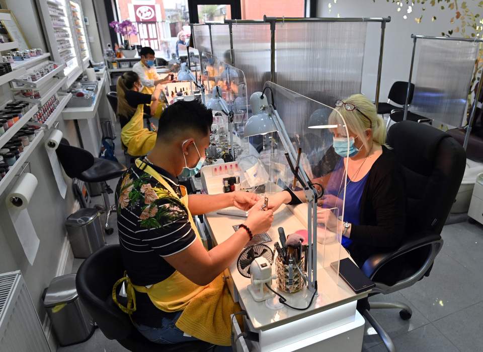 At Top Nails in Birkenhead, technicians were seated behind perspex screens