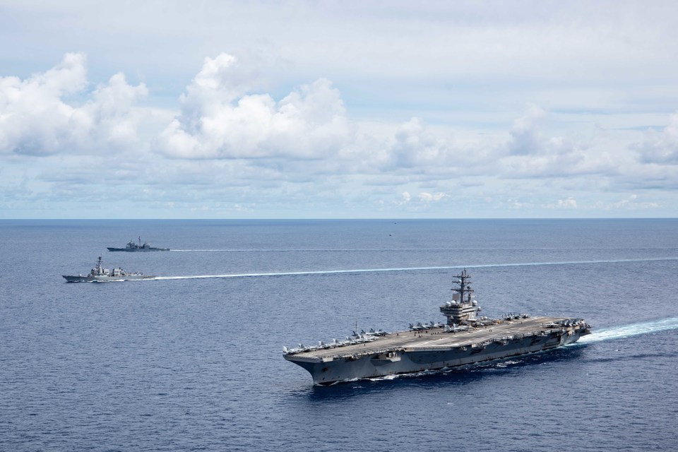 USS Ronald Reagan sails alongside USS Mustin and USS Antietam in the South China Sea