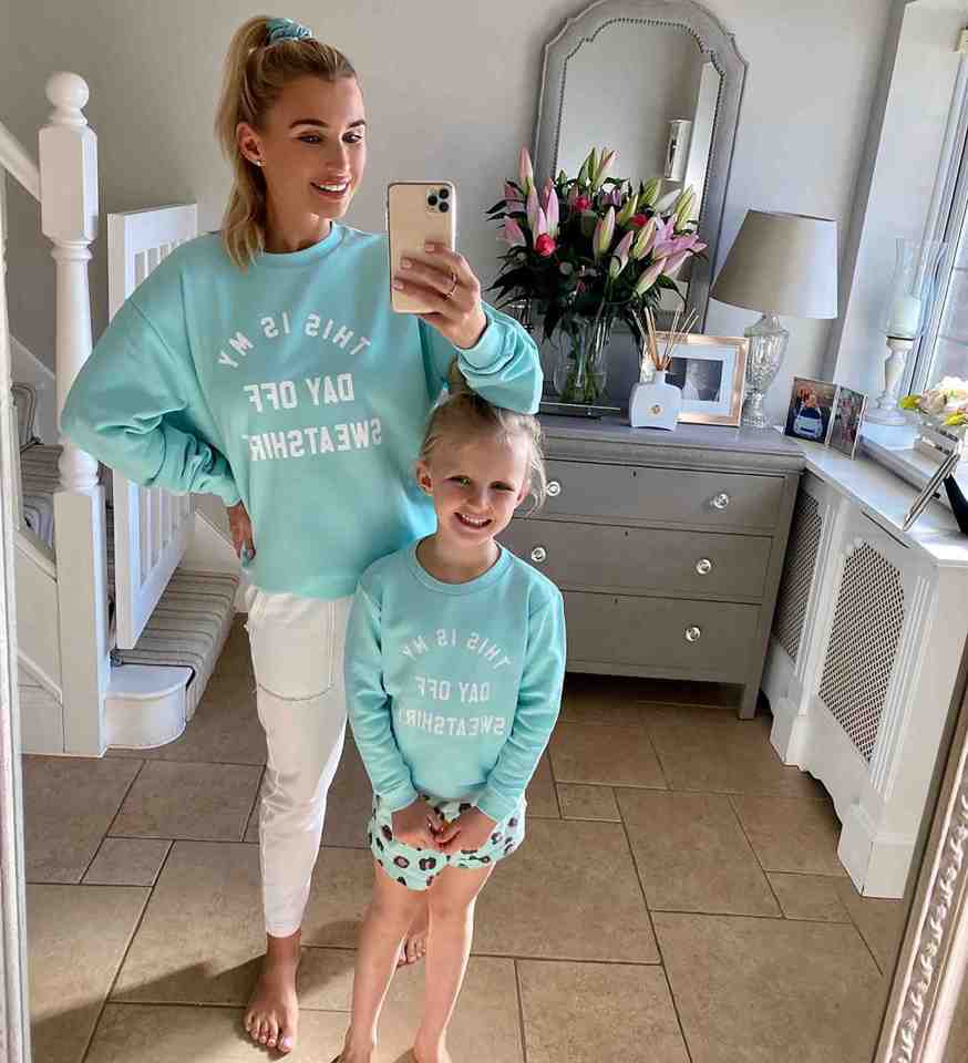 Billie Faiers and six-year-old Nelly are matching in turquoise logo sweatshirts