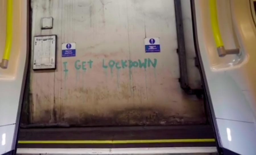 Banksy has scrawled the message 'I get lockdown' on a station wall