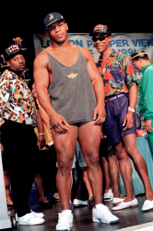 Mike Tyson showed off his shredded physique before his fight with Ruddock