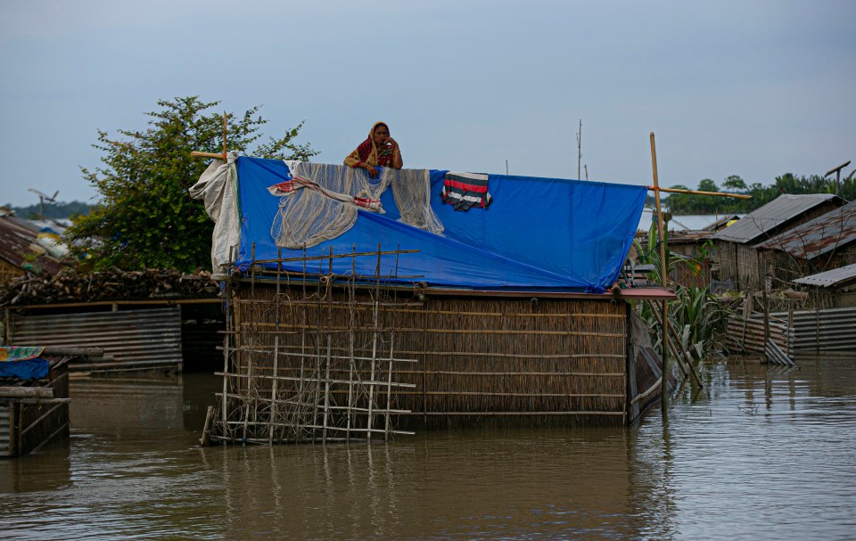 One woman was forced to evacuate on to the roof of her home