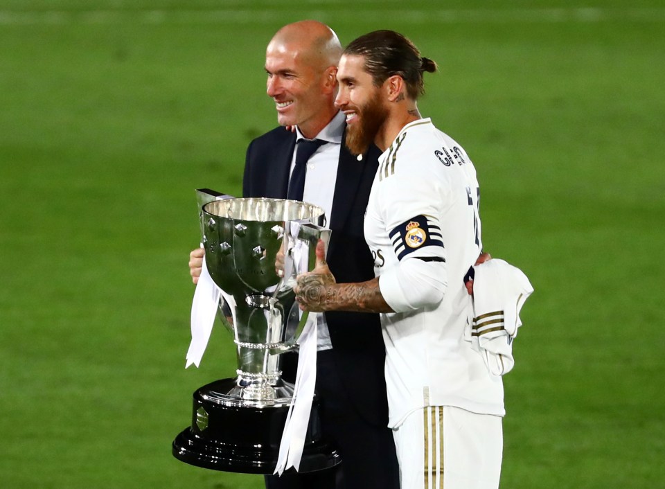 Zidane (left) and Sergio Ramos helped Madrid reclaim Spain's top football trophy from Barcelona who won the title last season 