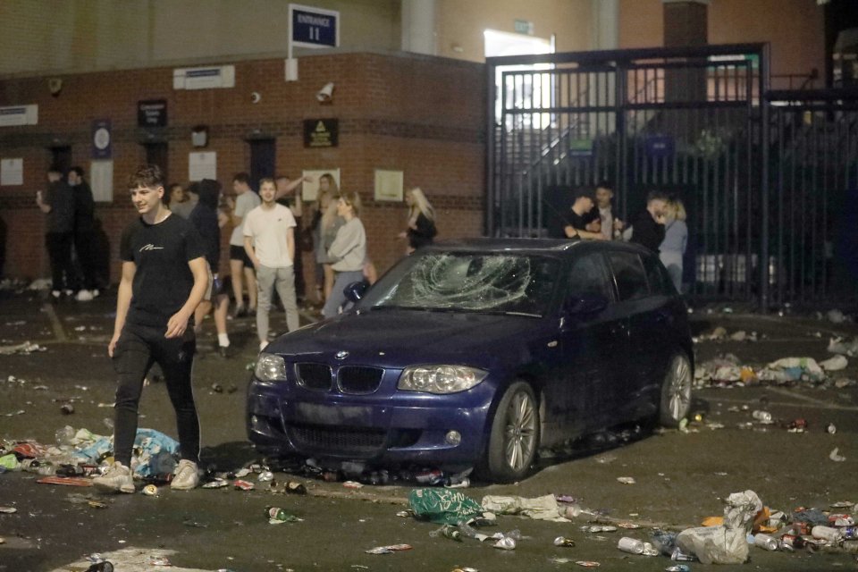 A BMW's windscreen was smashed in the mayhem