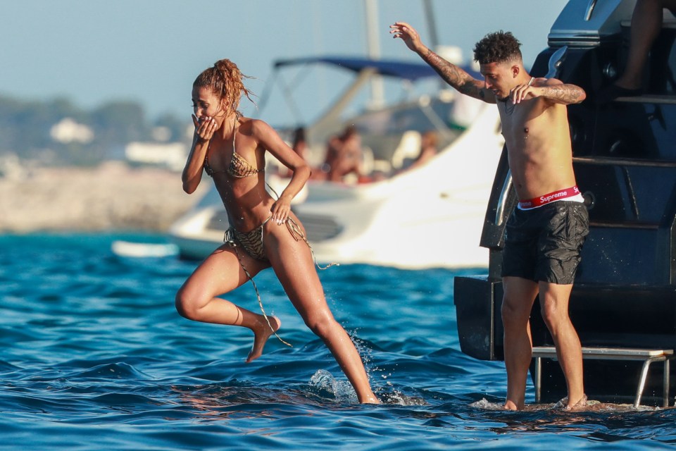 Jadon Sancho is enjoying a holiday in Ibiza with a mystery woman