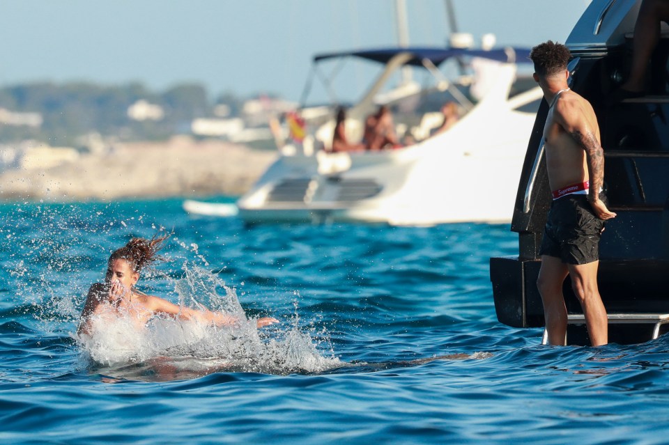 Sancho and his pal enjoyed a splash in the ocean