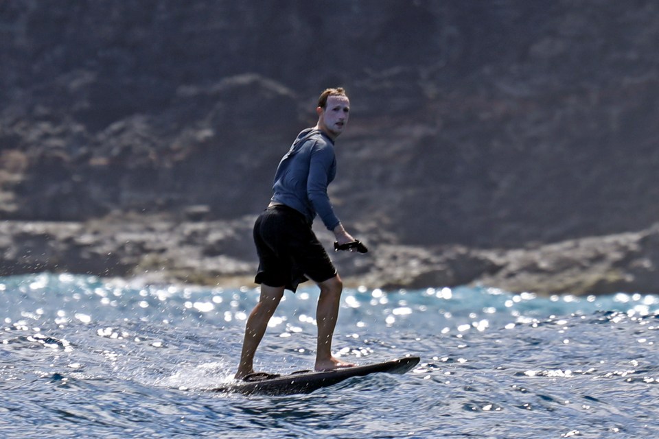 Zuckerberg on his electric surfboard – this image went viral when social media users mocked the amount of suncream on his face