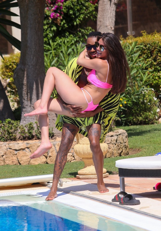 The pair soaked up the sun at a resort in Marbella, Spain