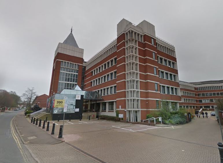 She stopped outside Sentinel House in Norwich, pictured, for just 15 seconds