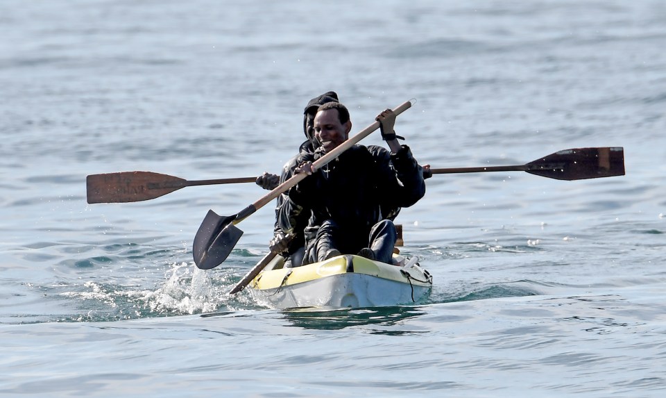 A desperate group of migrants trying to reach Dover by paddling with shovels earlier this week