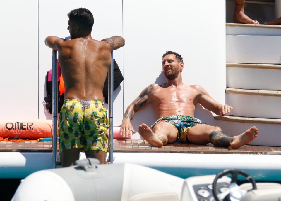 Messi looked content to sit and work on his tan