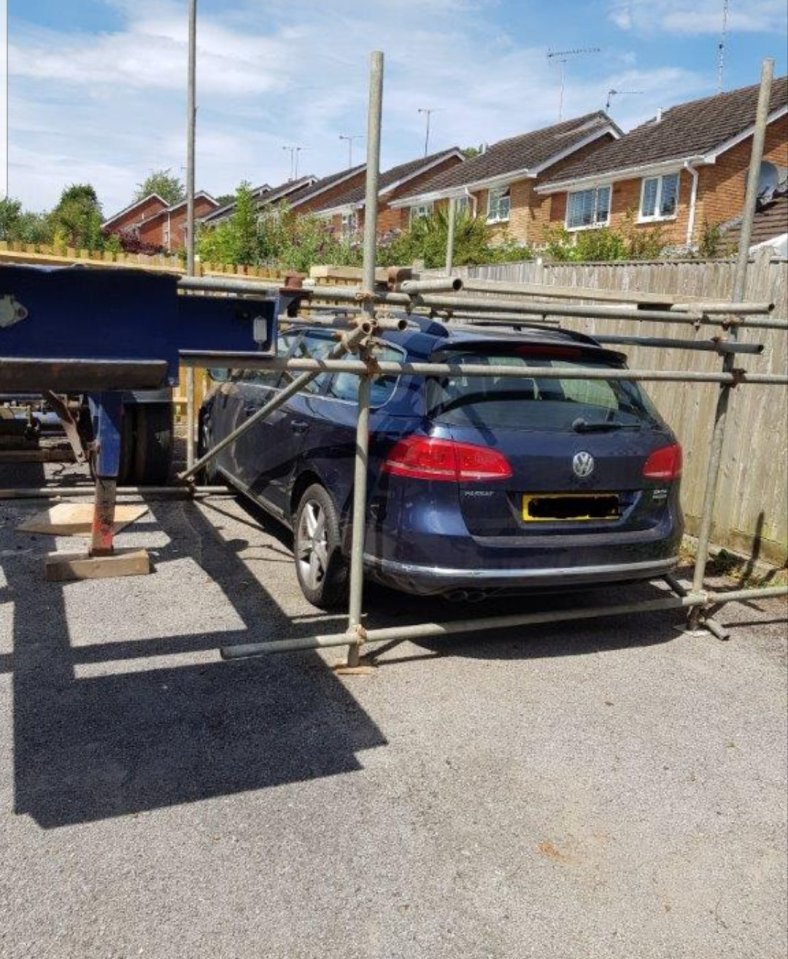 The vehicle was completely boxed in by the steel scaffolding poles