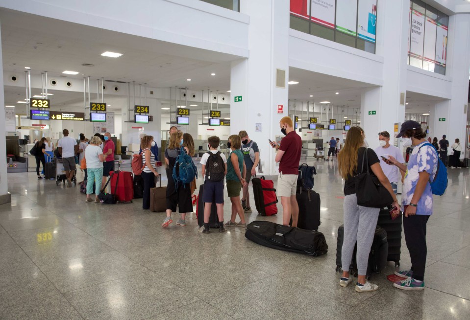 Brits queuing at Malaga Airport this morning