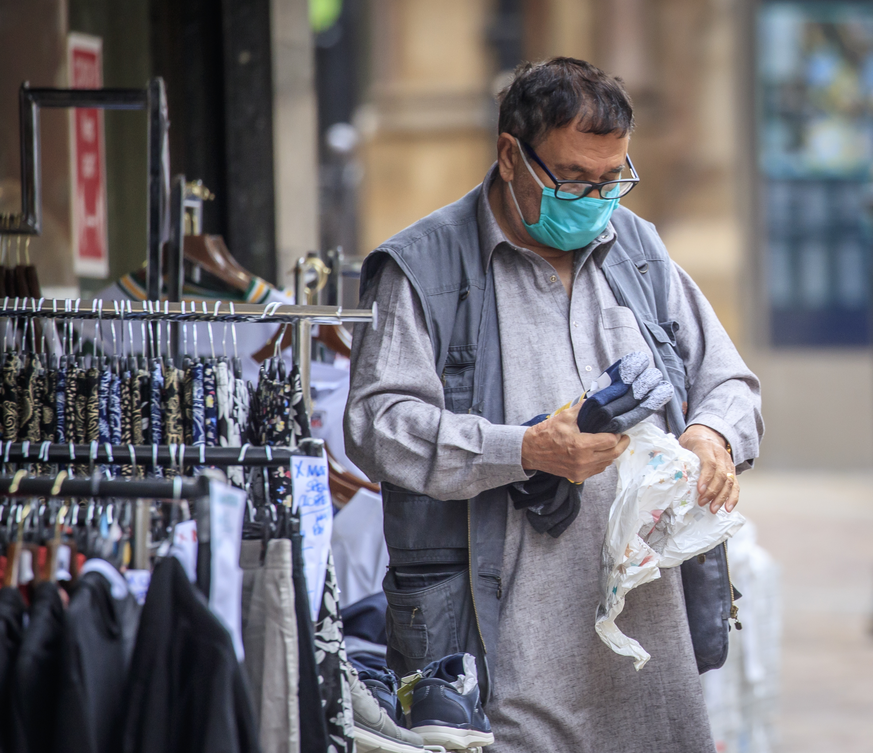 A man wearing a mask in Bradford, West Yorkshire